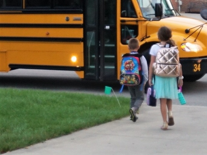 kids going to bus-584693-edited